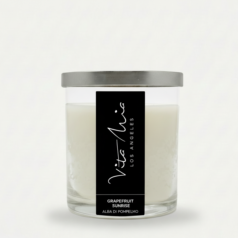Vela Nia candle with a black label on a white background